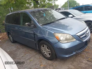 2005 Honda Odyssey EX-L with VIN 5FNRL38685B113633, listed as a IAAI auction lot 42035706 with 320,335 mi miles. Bid and sale history available at carsss.com. Image 1.