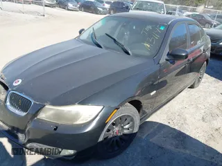 2009 BMW 3 Series 328i with VIN WBAPH77509NM31145, listed as a IAAI auction lot 41637654 with 206,024 mi miles. Bid and sale history available at carsss.com. Image 2.