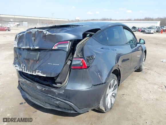 2023 Tesla Model Y Long Range with VIN 7SAYGDEE7PF755980, listed as a IAAI auction lot 41781433 with 31,427 mi miles. Bid and sale history available at carsss.com. Image 4.