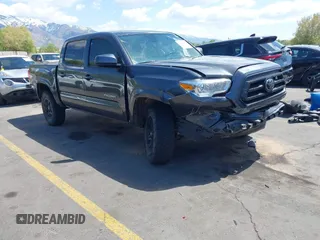 2020 Toyota Tacoma SR5 with VIN 3TMCZ5AN4LM310874, listed as a IAAI auction lot 42152561 with 100,909 mi miles and . Bid and sale history available at DreamBid. Image 1.
