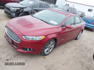 2016 Ford Fusion Titanium Hybrid with VIN 3FA6P0RU3GR355398, listed as a IAAI auction lot 41140669 with 125,959 mi miles. Bid and sale history available at carsss.com. Image 17.