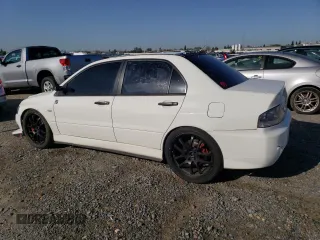 2005 Mitsubishi Lancer z VIN JA3AH36D85U043623, wystawiony jako Copart lot #52597975 z przebiegiem 171 445 mil mil oraz Czysty tytuł • Clean title. Historia ofert i sprzedaży dostępna na DreamBid. Obrazek 2.