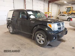 2008 Dodge Nitro SXT z VIN 1D8GU28K38W223518, wystawiony jako IAAI lot #42156598 z przebiegiem 151 568 mil mil oraz . Historia ofert i sprzedaży dostępna na DreamBid. Obrazek 1.