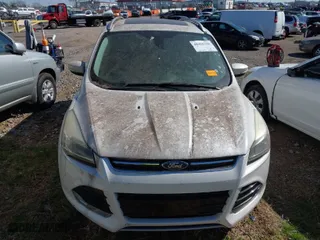 2015 Ford Escape Titanium with VIN 1FMCU0JX2FUA06571, listed as a IAAI auction lot 41855598 with 164,513 mi miles. Bid and sale history available at carsss.com. Image 6.