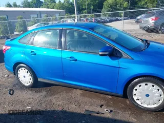 2012 Ford Focus SE with VIN 1FAHP3F2XCL327992, listed as a IAAI auction lot 42305746 with 65,229 mi miles and . Bid and sale history available at DreamBid. Image 13.
