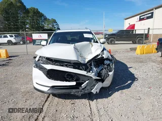 2018 Mazda CX-5 Grand Touring with VIN JM3KFADM0J0377026, listed as a IAAI auction lot 41649686 with 100,901 mi miles and . Bid and sale history available at DreamBid. Image 12.