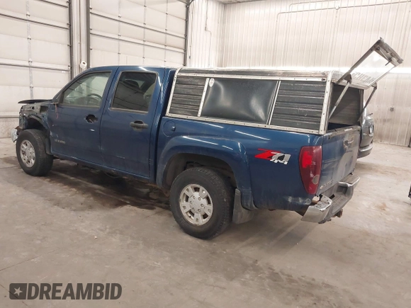 2005 Chevrolet Colorado 1SF LS Z71 with VIN 1GCDT136458138180, listed as a IAAI auction lot 41890561 with 135,653 mi miles. Bid and sale history available at carsss.com. Image 3.
