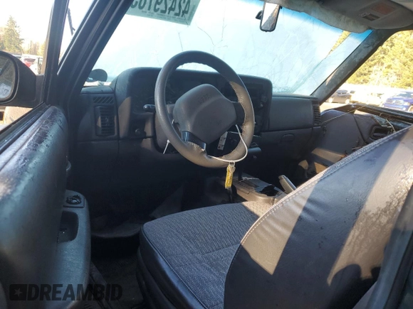 1999 Jeep Cherokee SE with VIN 1J4FF27S9XL667941, listed as a Copart auction lot 42429785 with 121,490 mi miles and Salvage title. Bid and sale history available at DreamBid. Image 8.
