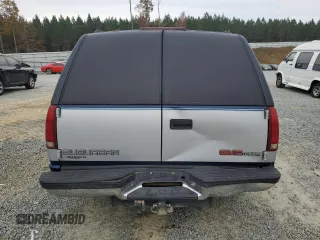 1994 GMC Suburban z VIN 1GKEC16K4RJ762562, wystawiony jako Copart lot #81242184 z przebiegiem 182 583 mil mil oraz Szkoda całkowita • Salvage title. Historia ofert i sprzedaży dostępna na DreamBid. Obrazek 6.