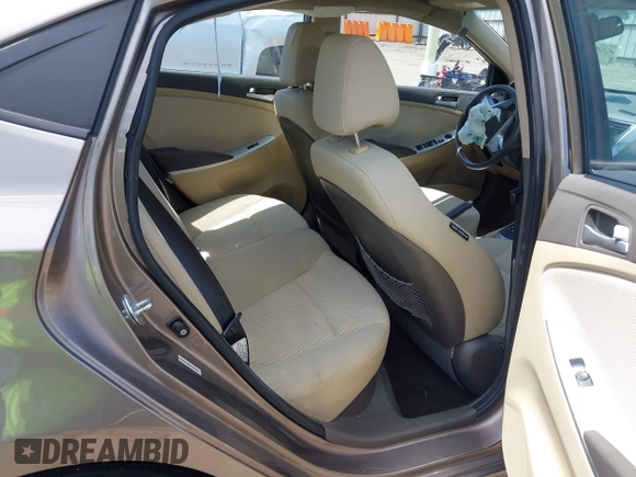 2012 Hyundai Accent GLS z VIN KMHCT4AE1CU186212, wystawiony jako IAAI lot #42247043 z przebiegiem 140 287 mil mil oraz . Historia ofert i sprzedaży dostępna na DreamBid. Obrazek 8.