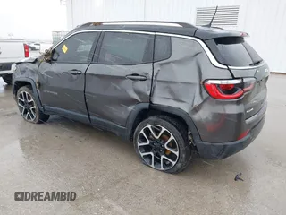 2018 Jeep Compass Limited with VIN 3C4NJDCB4JT115647, listed as a IAAI auction lot 41728750 with 127,290 mi miles and . Bid and sale history available at carsss.com. Image 3.