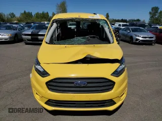 2022 Ford Transit Connect XLT with VIN NM0LS7T28N1527571, listed as a Copart auction lot 43587235 with 8,620 mi miles and Salvage title. Bid and sale history available at DreamBid. Image 5.