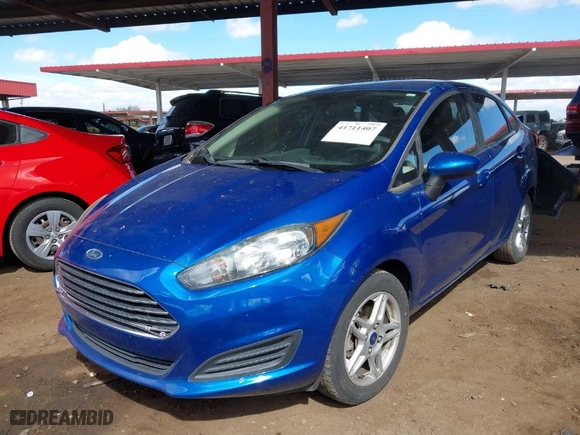 2018 Ford Fiesta SE with VIN 3FADP4BJXJM147053, listed as a IAAI auction lot 41711407 with 69,227 mi miles. Bid and sale history available at carsss.com. Image 2.