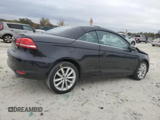 2015 Volkswagen Eos Komfort with VIN WVWBW8AH6FV005693, listed as a Copart auction lot 79176614 with 106,556 mi miles and Salvage Title. Bid and sale history available at DreamBid. Image 3.