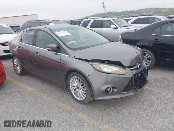 2014 Ford Focus Titanium with VIN 1FADP3J20EL236805, listed as a IAAI auction lot 41708437 with 105,724 mi miles. Bid and sale history available at carsss.com. Image 1.