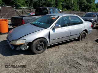 1999 Honda Accord LX with VIN 1HGCG6658XA137806, listed as a Copart auction lot 58909815 with Not provided miles and Salvage title. Bid and sale history available at DreamBid. Image 1.