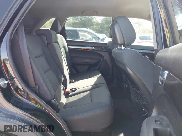 2013 Kia Sorento LX with VIN 5XYKTCA60DG347929, listed as a IAAI auction lot 42144507 with 210,216 mi miles. Bid and sale history available at carsss.com. Image 8.