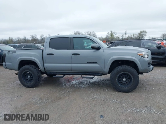 2021 Toyota Tacoma SR z VIN 3TMCZ5AN5MM372821, wystawiony jako IAAI lot #41886586 z przebiegiem 68 878 mil mil oraz . Historia ofert i sprzedaży dostępna na DreamBid. Obrazek 13.