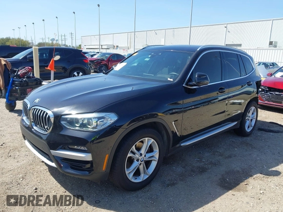 2021 BMW X3 sDrive30i with VIN 5UXTY3C09M9F84579, listed as a IAAI auction lot 41853738 with 56,809 mi miles and . Bid and sale history available at DreamBid. Image 2.