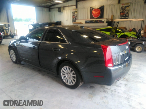 2013 Cadillac CTS Luxury with VIN 1G6DE5E54D0156491, listed as a IAAI auction lot 39844556 with 104,089 mi miles and . Bid and sale history available at DreamBid. Image 3.