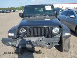 2021 Jeep Wrangler Sport S with VIN 1C4HJXAG6MW744998, listed as a IAAI auction lot 42170965 with 59,373 mi miles and . Bid and sale history available at DreamBid. Image 12.
