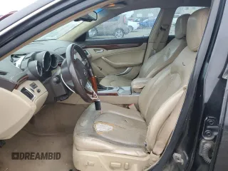 2009 Cadillac CTS RWD w/1SA with VIN 1G6DF577890122363, listed as a Copart auction lot 71401644 with 127,968 mi miles and Salvage Title. Bid and sale history available at carsss.com. Image 7.