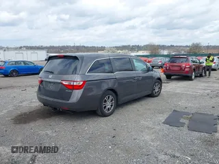 2013 Honda Odyssey EX-L with VIN 5FNRL5H63DB034963, listed as a IAAI auction lot 41921431 with 163,609 mi miles and . Bid and sale history available at DreamBid. Image 4.