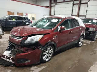 2016 Ford Escape Titanium with VIN 1FMCU9JX6GUB57497, listed as a IAAI auction lot 41375019 with 1 mi miles. Bid and sale history available at carsss.com. Image 17.