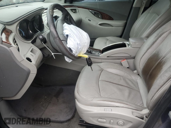 2013 Buick LaCrosse Leather с VIN 1G4GC5E39DF258425, выставлен на аукционе Copart как лот 60646225 с пробегом 152 288 миль миль и Списание • Salvage title. История ставок и продаж доступна на DreamBid. Изображение 7.