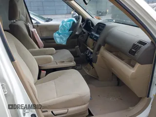 2005 Honda CR-V EX with VIN SHSRD78895U319168, listed as a IAAI auction lot 38894224 with 113,330 mi miles. Bid and sale history available at carsss.com. Image 5.