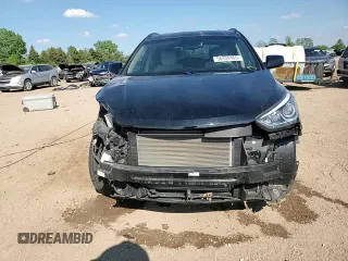 2017 Hyundai Santa Fe 2.4L z VIN 5NMZUDLB1HH034797, wystawiony jako Copart lot #56834465 z przebiegiem 47 528 mil mil oraz Szkoda całkowita • Salvage title. Historia ofert i sprzedaży dostępna na DreamBid. Obrazek 13.