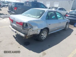 2002 Honda Accord EX z VIN JHMCG56612C026303, wystawiony jako IAAI lot #41992812 z przebiegiem 153 021 mil mil oraz . Historia ofert i sprzedaży dostępna na DreamBid. Obrazek 4.
