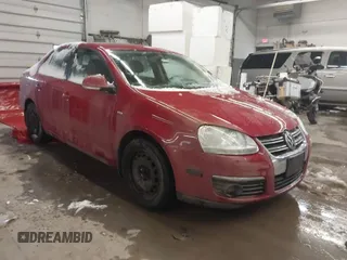 2008 Volkswagen Jetta Sedan Wolfsburg with VIN 3VWRJ71K38M137887, listed as a IAAI auction lot 41486256 with 105,998 mi miles. Bid and sale history available at carsss.com. Image 1.