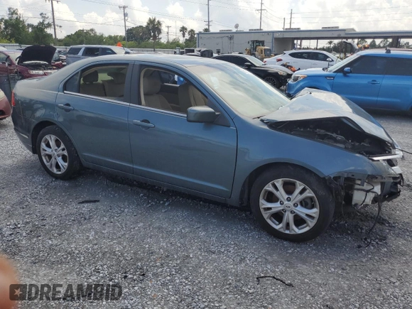 2012 Ford Fusion SE z VIN 3FAHP0HA1CR372744, wystawiony jako Copart lot #59118315 z przebiegiem Nie podano mil oraz Szkoda całkowita • Salvage title. Historia ofert i sprzedaży dostępna na DreamBid. Obrazek 4.