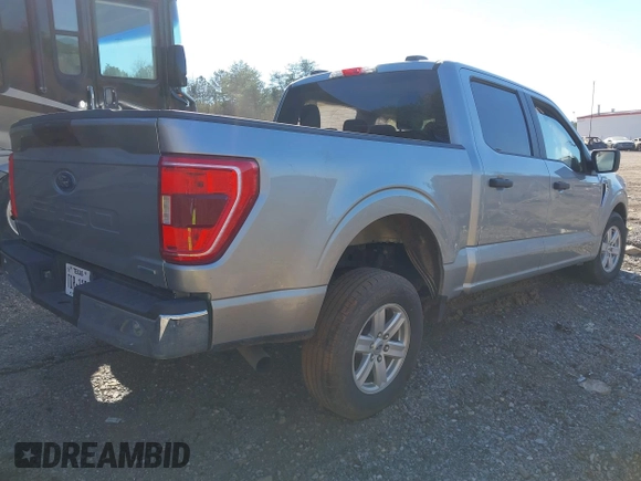 2023 Ford F-150 XL with VIN 1FTEW1C80PKE77571, listed as a IAAI auction lot 41648122 with 49,196 mi miles and . Bid and sale history available at DreamBid. Image 4.