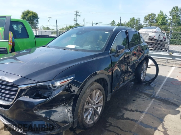 2021 Mazda CX-9 Carbon Edition with VIN JM3TCBDY3M0524241, listed as a IAAI auction lot 42538127 with 50,533 mi miles and . Bid and sale history available at DreamBid. Image 6.