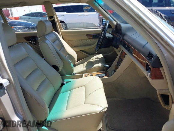 1989 Mercedes-Benz 560 with VIN WDBCA39D7KA436793, listed as a IAAI auction lot 42190980 with 141,165 mi miles and . Bid and sale history available at DreamBid. Image 5.