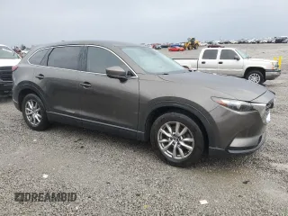 2017 Mazda CX-9 Touring with VIN JM3TCBCY0H0133586, listed as a Copart auction lot 50993075 with 103,125 mi miles and Salvage title. Bid and sale history available at DreamBid. Image 4.
