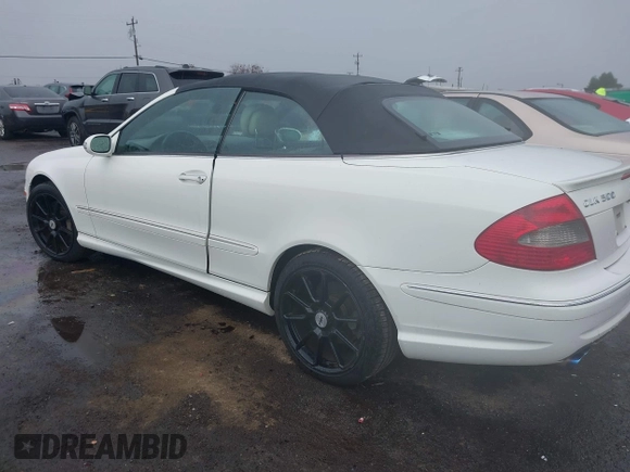 2006 Mercedes-Benz CLK-Class 5.0L with VIN WDBTK75G36T066621, listed as a IAAI auction lot 41009612 with 135,931 mi miles. Bid and sale history available at carsss.com. Image 3.