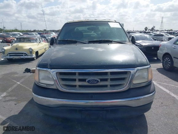 2001 Ford F-150 SuperCrew XLT with VIN 1FTRW07WX1KA43606, listed as a IAAI auction lot 41956736 with 278,543 mi miles. Bid and sale history available at carsss.com. Image 6.