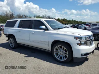 2019 Chevrolet Suburban Premier with VIN 1GNSKJKJ7KR339570, listed as a Copart auction lot 60350984 with 114,689 mi miles and Non Repairable. Bid and sale history available at DreamBid. Image 4.