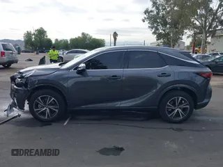 2024 Lexus RX 350 with VIN 2T2BAMBA1RC034871, listed as a IAAI auction lot 40959236 with 8,218 mi miles and . Bid and sale history available at DreamBid. Image 14.