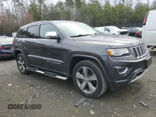 2015 Jeep Grand Cherokee Overland with VIN 1C4RJFCG0FC848046, listed as a Copart auction lot 49514795 with 212,688 mi miles and Clean title. Bid and sale history available at DreamBid. Image 4.