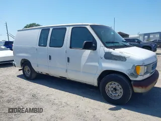 2002 Ford Econoline Cargo with VIN 1FTRE14272HA57164, listed as a IAAI auction lot 42071945 with 236,387 mi miles. Bid and sale history available at carsss.com. Image 1.