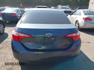 2016 Toyota Corolla L with VIN 5YFBURHE3GP564887, listed as a IAAI auction lot 42390190 with 97,642 mi miles and . Bid and sale history available at DreamBid. Image 16.