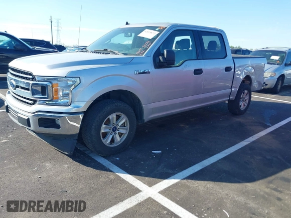 2019 Ford F-150 XL with VIN 1FTEW1C54KKC55212, listed as a IAAI auction lot 42025872 with 143,485 mi miles and . Bid and sale history available at DreamBid. Image 2.