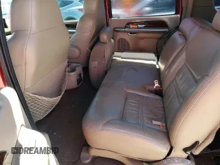 2000 Ford Excursion Limited z VIN 1FMNU42S2YED84910, wystawiony jako Copart lot #57272245 z przebiegiem 235 173 mil mil oraz Szkoda całkowita • Salvage title. Historia ofert i sprzedaży dostępna na DreamBid. Obrazek 11.