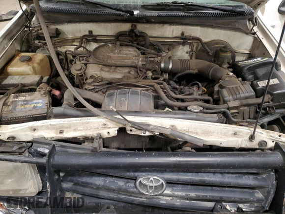 1993 Toyota T100 DX z VIN JT4VD10A0P0013396, wystawiony jako Copart lot #43002405 z przebiegiem 137 000 mil mil oraz Szkoda całkowita • Salvage title. Historia ofert i sprzedaży dostępna na DreamBid. Obrazek 13.