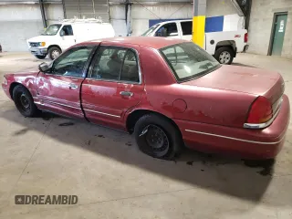 1999 Ford Crown Victoria z VIN 2FAFP73W3XX114736, wystawiony jako Copart lot #68501254 z przebiegiem 137 334 mil mil oraz Szkoda całkowita • Salvage title. Historia ofert i sprzedaży dostępna na DreamBid. Obrazek 2.