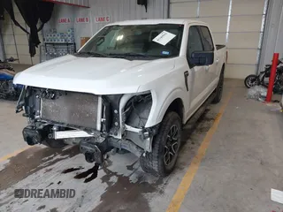 2023 Ford F-150 XL with VIN 1FTEW1EPXPKF97673, listed as a IAAI auction lot 41349562 with 35,687 mi miles. Bid and sale history available at carsss.com. Image 2.